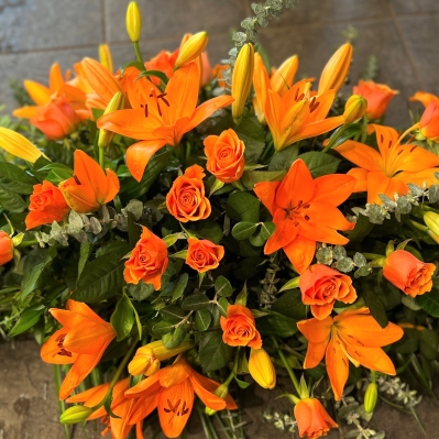 Orange Rose and Lily Casket Spray