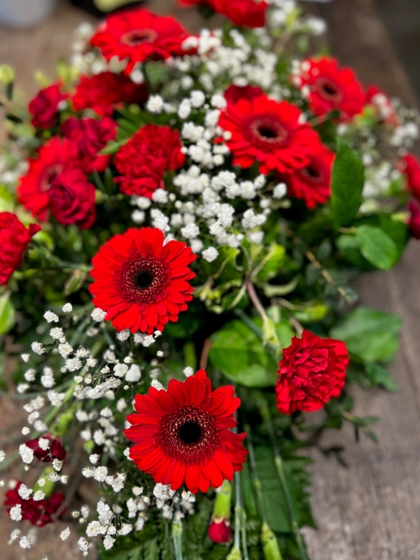 Red Carnation and Germini teardrop spray