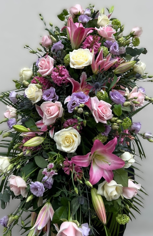 Rose, Lily and Eryngium Casket spray