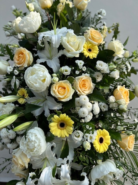 White and Yellow Casket Spray
