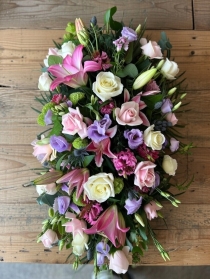 Rose, Lily and Eryngium Casket spray