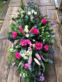 Cerise Pink, Purples and Creams casket spray