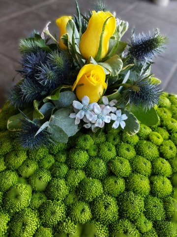 Golf green funeral tribute