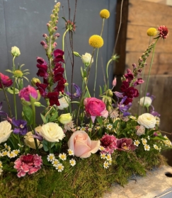 Linear funeral arrangement