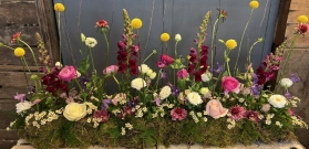 Linear funeral arrangement