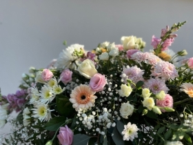 Soft pastels casket spray